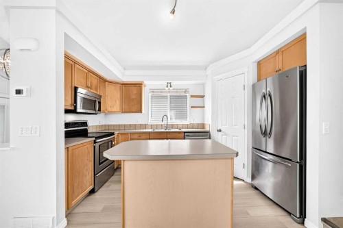 352 Copperfield Gardens Se, Calgary, AB - Indoor Photo Showing Kitchen With Double Sink