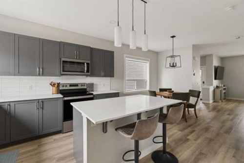 12 Wolf Creek Drive Se, Calgary, AB - Indoor Photo Showing Kitchen With Stainless Steel Kitchen