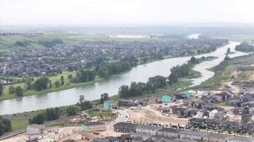 12 Wolf Creek Drive Se, Calgary, AB - Outdoor With Body Of Water With View