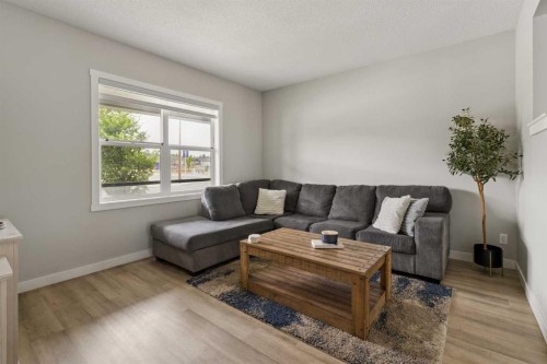 12 Wolf Creek Drive Se, Calgary, AB - Indoor Photo Showing Living Room
