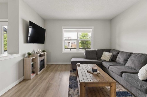 12 Wolf Creek Drive Se, Calgary, AB - Indoor Photo Showing Living Room