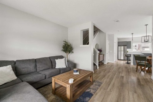12 Wolf Creek Drive Se, Calgary, AB - Indoor Photo Showing Living Room
