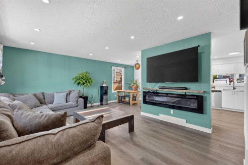 24 Penworth Crescent Se, Calgary, AB - Indoor Photo Showing Living Room