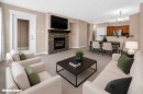 537-10 Discovery Ridge Close Sw, Calgary, AB  - Indoor Photo Showing Living Room With Fireplace 