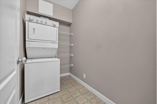537-10 Discovery Ridge Close Sw, Calgary, AB - Indoor Photo Showing Laundry Room