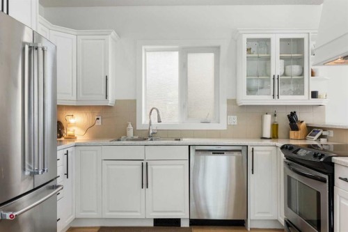 501 55 Avenue Sw, Calgary, AB - Indoor Photo Showing Kitchen With Stainless Steel Kitchen With Double Sink