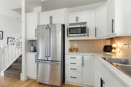 501 55 Avenue Sw, Calgary, AB - Indoor Photo Showing Kitchen With Double Sink