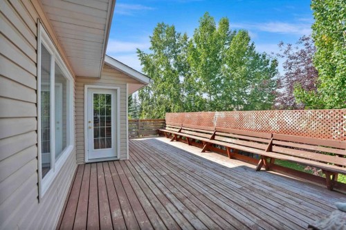62 West Mitford Crescent, Cochrane, AB - Outdoor With Deck Patio Veranda With Exterior