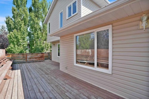 62 West Mitford Crescent, Cochrane, AB - Outdoor With Deck Patio Veranda With Exterior