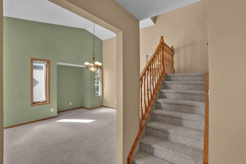 62 West Mitford Crescent, Cochrane, AB - Indoor Photo Showing Other Room