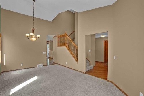 62 West Mitford Crescent, Cochrane, AB - Indoor Photo Showing Other Room