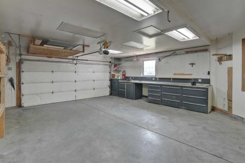 62 West Mitford Crescent, Cochrane, AB - Indoor Photo Showing Garage