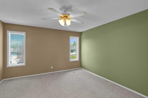 62 West Mitford Crescent, Cochrane, AB - Indoor Photo Showing Other Room