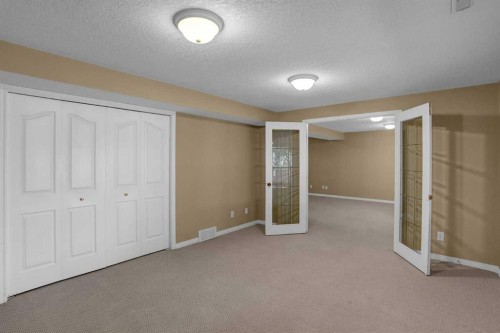62 West Mitford Crescent, Cochrane, AB - Indoor Photo Showing Other Room