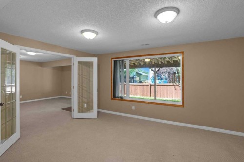 62 West Mitford Crescent, Cochrane, AB - Indoor Photo Showing Other Room