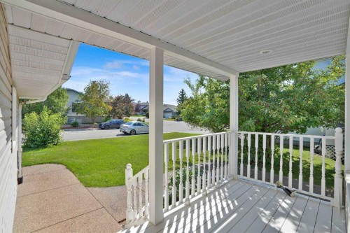 62 West Mitford Crescent, Cochrane, AB - Outdoor With Deck Patio Veranda With Exterior