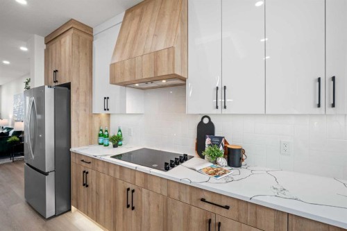 1981 Mccaskill Drive, Crossfield, AB - Indoor Photo Showing Kitchen With Upgraded Kitchen