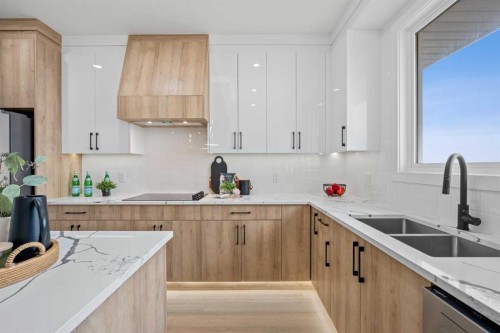 1981 Mccaskill Drive, Crossfield, AB - Indoor Photo Showing Kitchen With Double Sink