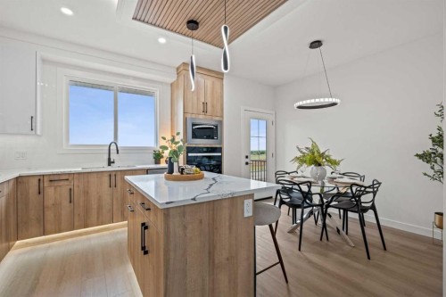 1981 Mccaskill Drive, Crossfield, AB - Indoor Photo Showing Kitchen With Upgraded Kitchen