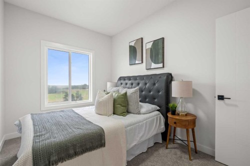 1981 Mccaskill Drive, Crossfield, AB - Indoor Photo Showing Bedroom