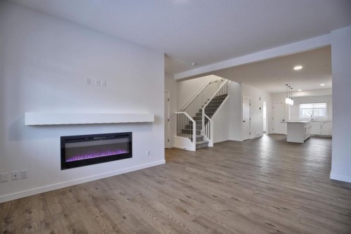 45 Legacy Point Terrace Se, Calgary, AB - Indoor Photo Showing Living Room With Fireplace