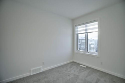 45 Legacy Point Terrace Se, Calgary, AB - Indoor Photo Showing Other Room