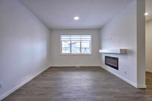 45 Legacy Point Terrace Se, Calgary, AB - Indoor With Fireplace