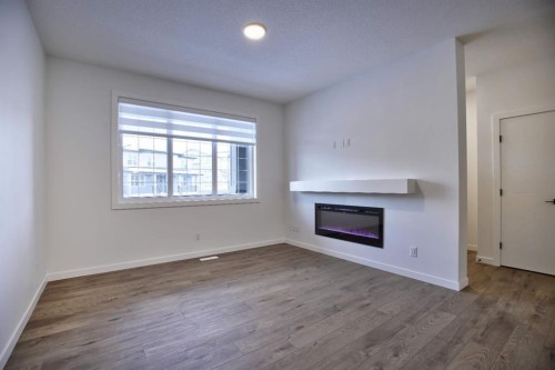 45 Legacy Point Terrace Se, Calgary, AB - Indoor With Fireplace
