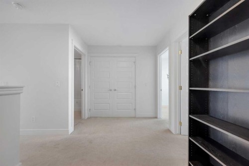 250 Carrington Gate Nw, Calgary, AB - Indoor Photo Showing Other Room