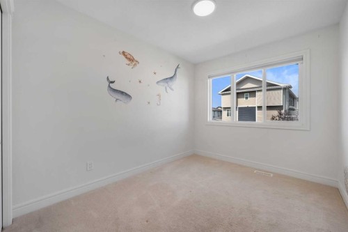 250 Carrington Gate Nw, Calgary, AB - Indoor Photo Showing Other Room