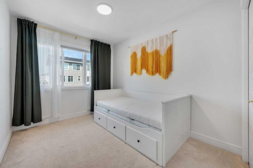 250 Carrington Gate Nw, Calgary, AB - Indoor Photo Showing Bedroom