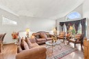 2709 Signal Hill Bay Sw, Calgary, AB  - Indoor Photo Showing Living Room 