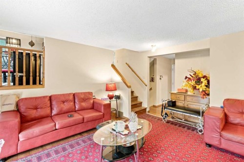 2709 Signal Hill Bay Sw, Calgary, AB - Indoor Photo Showing Living Room