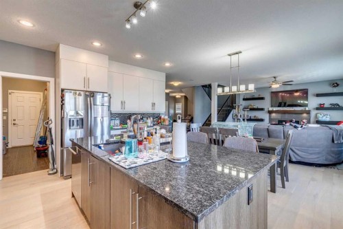 168 Rainbow Falls Heath, Chestermere, AB - Indoor Photo Showing Kitchen With Upgraded Kitchen