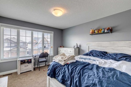 168 Rainbow Falls Heath, Chestermere, AB - Indoor Photo Showing Bedroom
