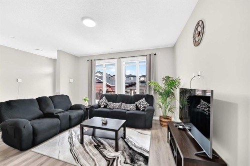 75 Howse Crescent Ne, Calgary, AB - Indoor Photo Showing Living Room