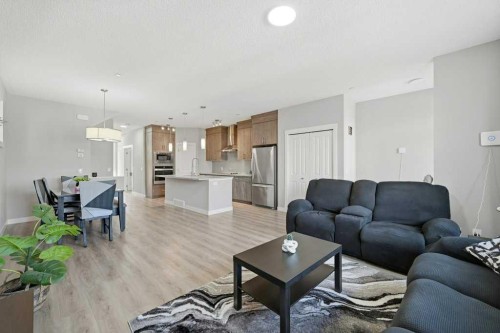 75 Howse Crescent Ne, Calgary, AB - Indoor Photo Showing Living Room