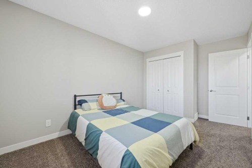 75 Howse Crescent Ne, Calgary, AB - Indoor Photo Showing Bedroom