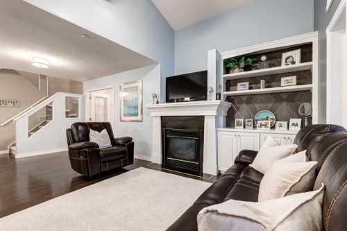 331 Sierra Madre Court Sw, Calgary, AB - Indoor Photo Showing Living Room With Fireplace