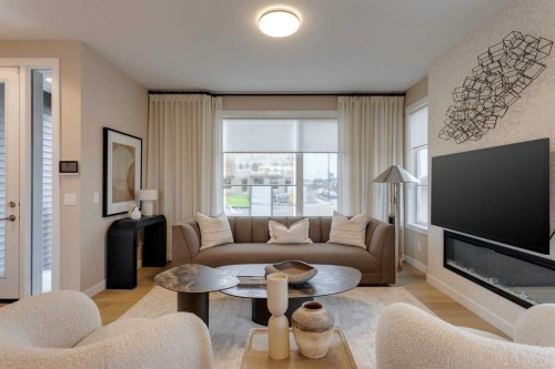 189 Cobblestone Gate Sw, Airdrie, AB - Indoor Photo Showing Living Room With Fireplace