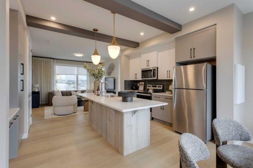 189 Cobblestone Gate Sw, Airdrie, AB - Indoor Photo Showing Kitchen With Stainless Steel Kitchen With Upgraded Kitchen