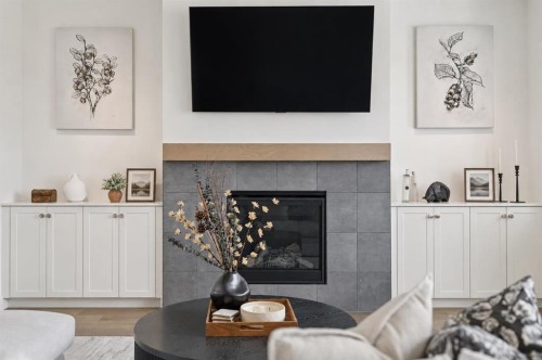 430 Monterra Bay, Cochrane Lake, AB - Indoor Photo Showing Living Room With Fireplace