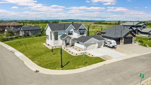 430 Monterra Bay, Cochrane Lake, AB - Outdoor With Facade With View