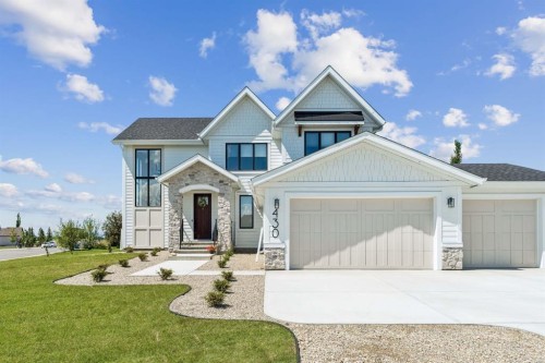 430 Monterra Bay, Cochrane Lake, AB - Outdoor With Facade