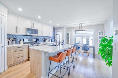 28 Copperfield Heath Se, Calgary, AB - Indoor Photo Showing Kitchen With Upgraded Kitchen