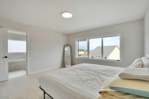 101 Wolf Hollow Terrace Se, Calgary, AB - Indoor Photo Showing Bedroom