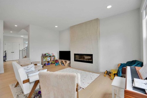101 Wolf Hollow Terrace Se, Calgary, AB - Indoor Photo Showing Living Room With Fireplace