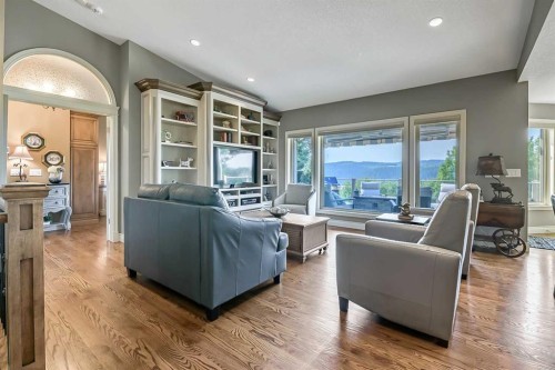 34 Sunrise Way, Priddis Greens, AB - Indoor Photo Showing Living Room