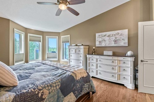34 Sunrise Way, Priddis Greens, AB - Indoor Photo Showing Bedroom