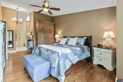34 Sunrise Way, Priddis Greens, AB - Indoor Photo Showing Bedroom
